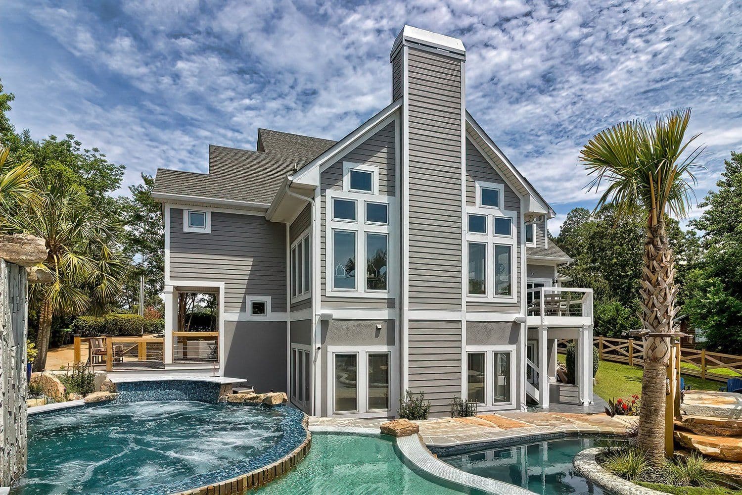 Residential home exterior with a landscaped yard