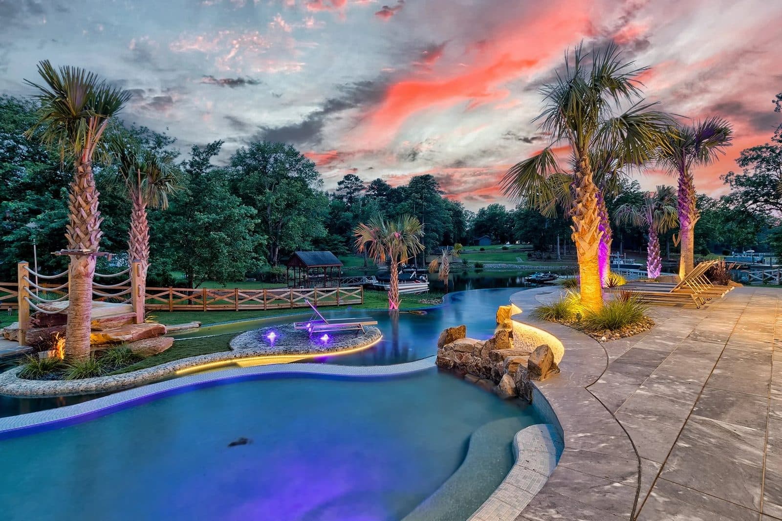 A pool and Lake Murray view at dusk in Chapin, South Carolina