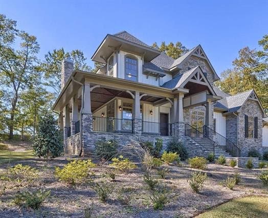 A stone and white Craftsman-style home in West Columbia, South Carolina