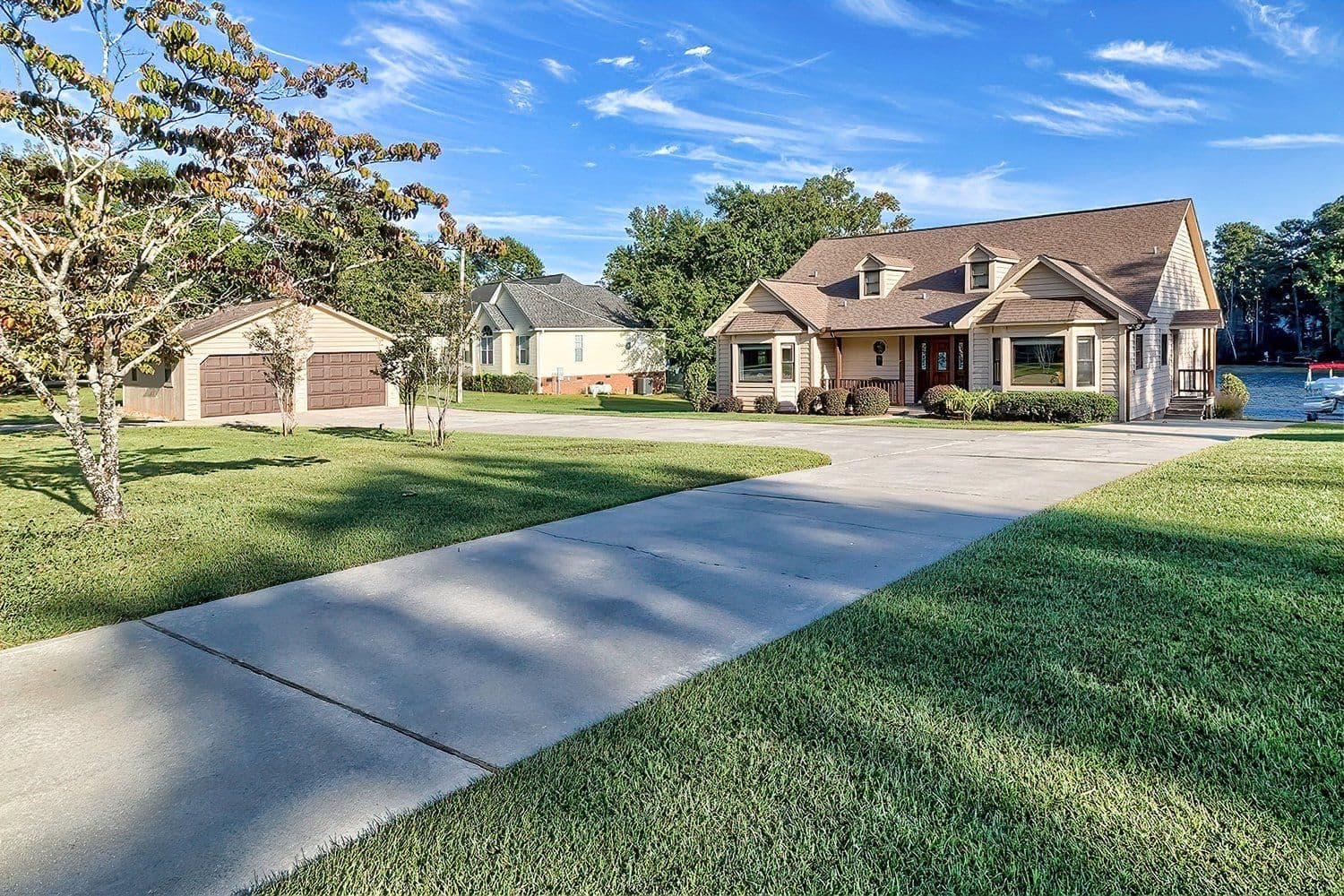 Light-colored brick one-story ranch home