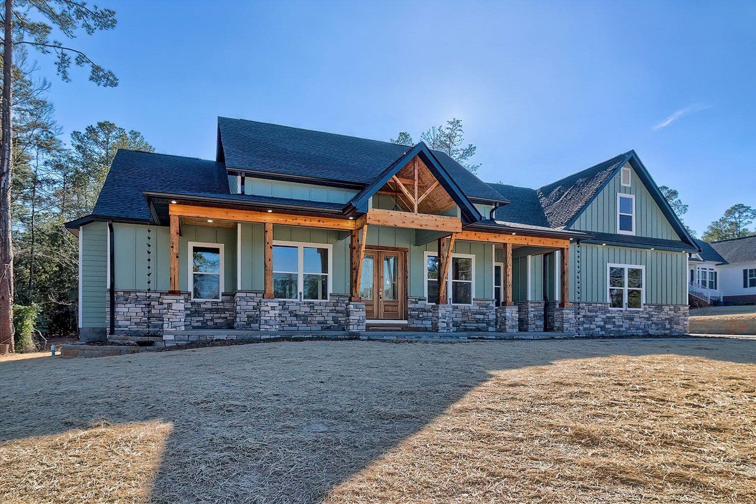 Two-story home with stone and siding