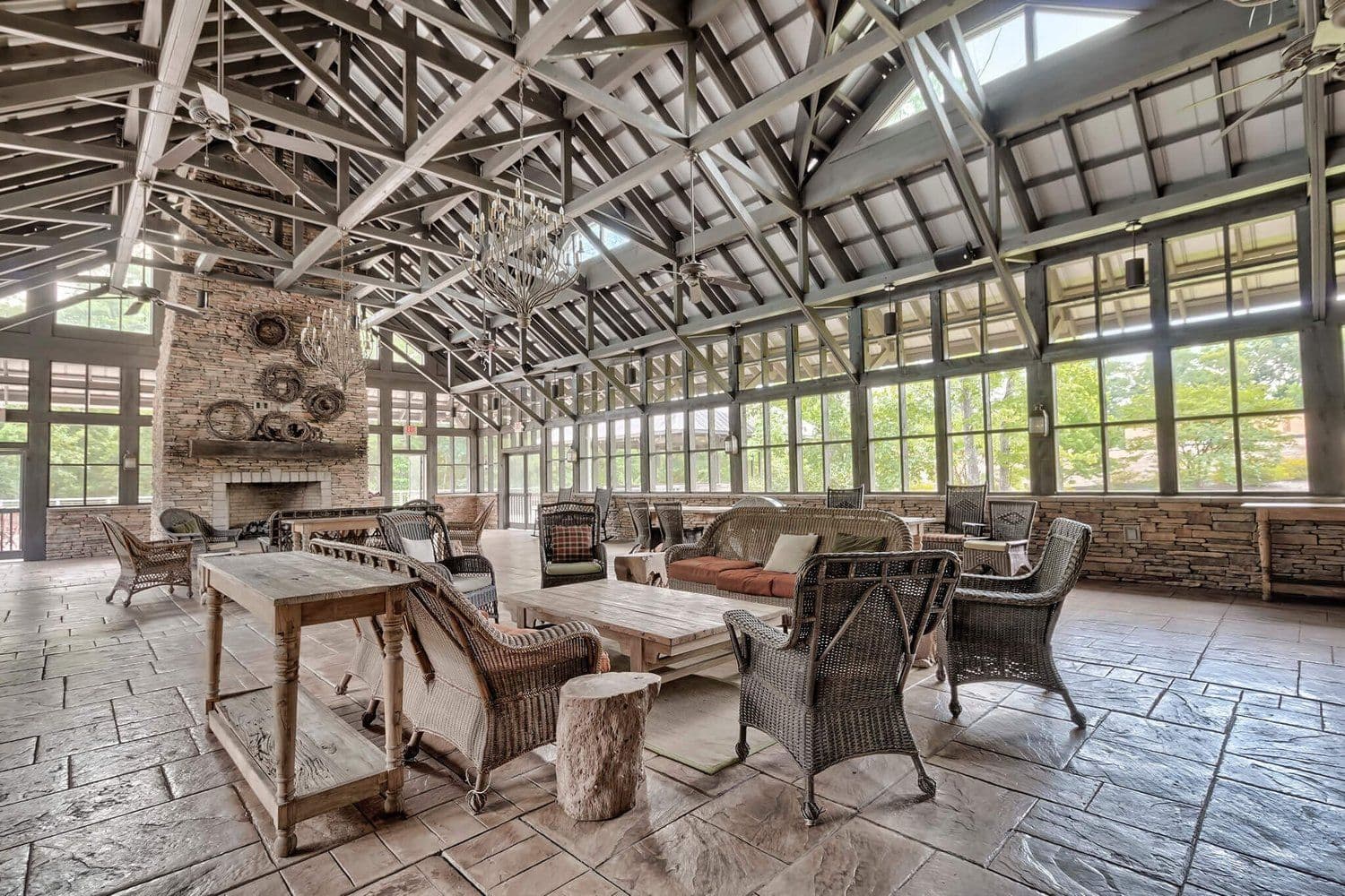 Rustic community clubhouse with exposed wooden beams and lounge seating