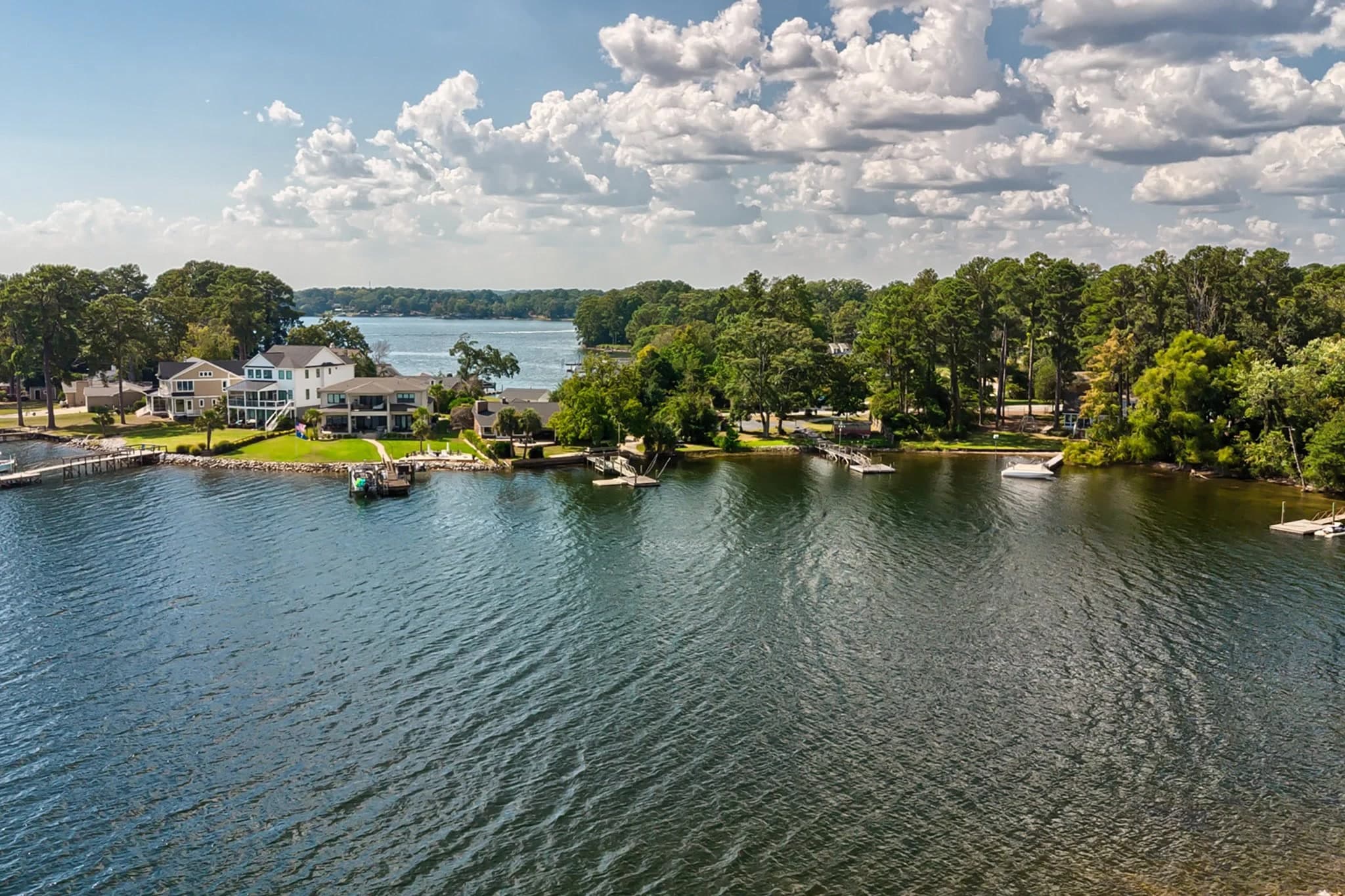 Docks along a wooded shoreline