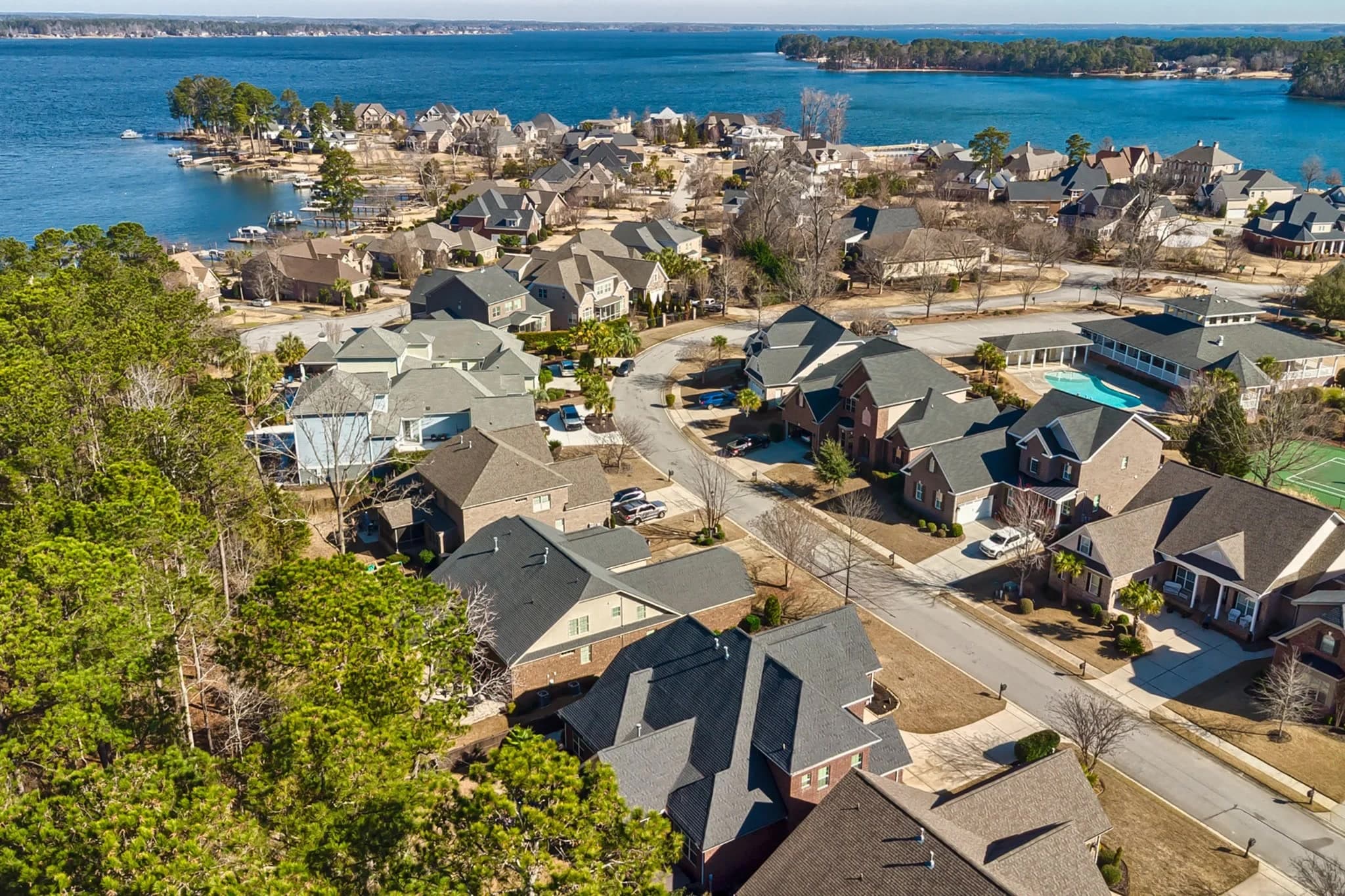 Turners Pointe on a peninsula with a community pool and tennis courts